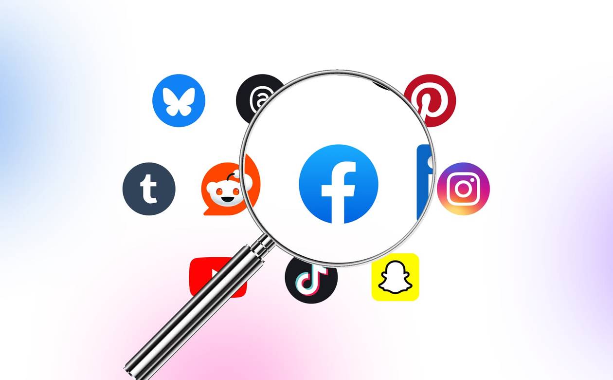 An illustration of a magnifying glass zooming in on social media platform icons.